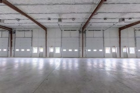 Open warehouse interior with grade-level doors